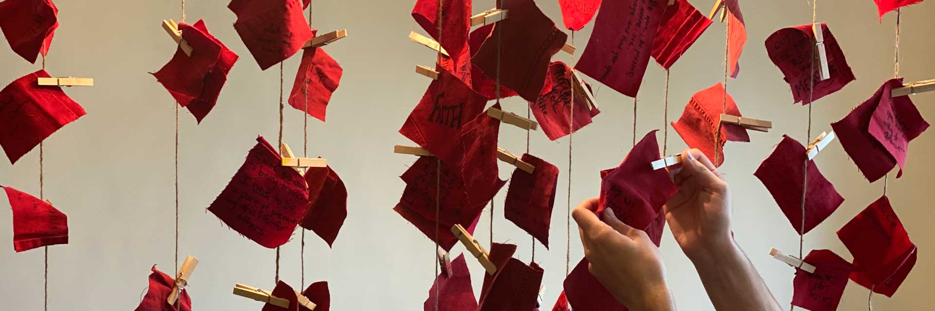 Swatches of red denim for Red Jeans Redemption project